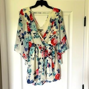 Sweet summer floral romper. Sheer, but lined